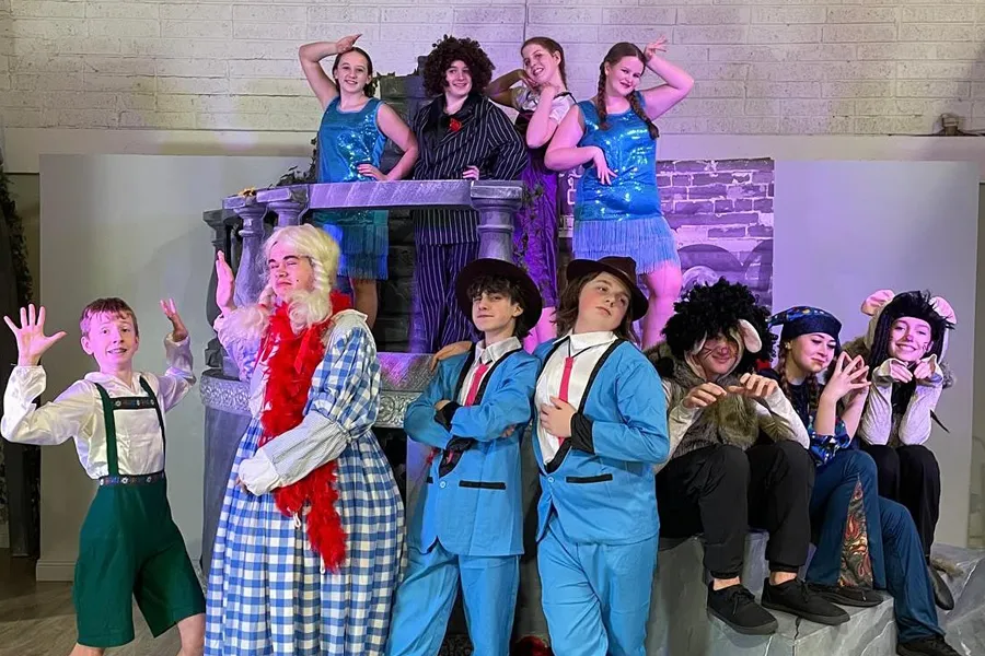 Wolfe Pack cast taking a bow after a performance